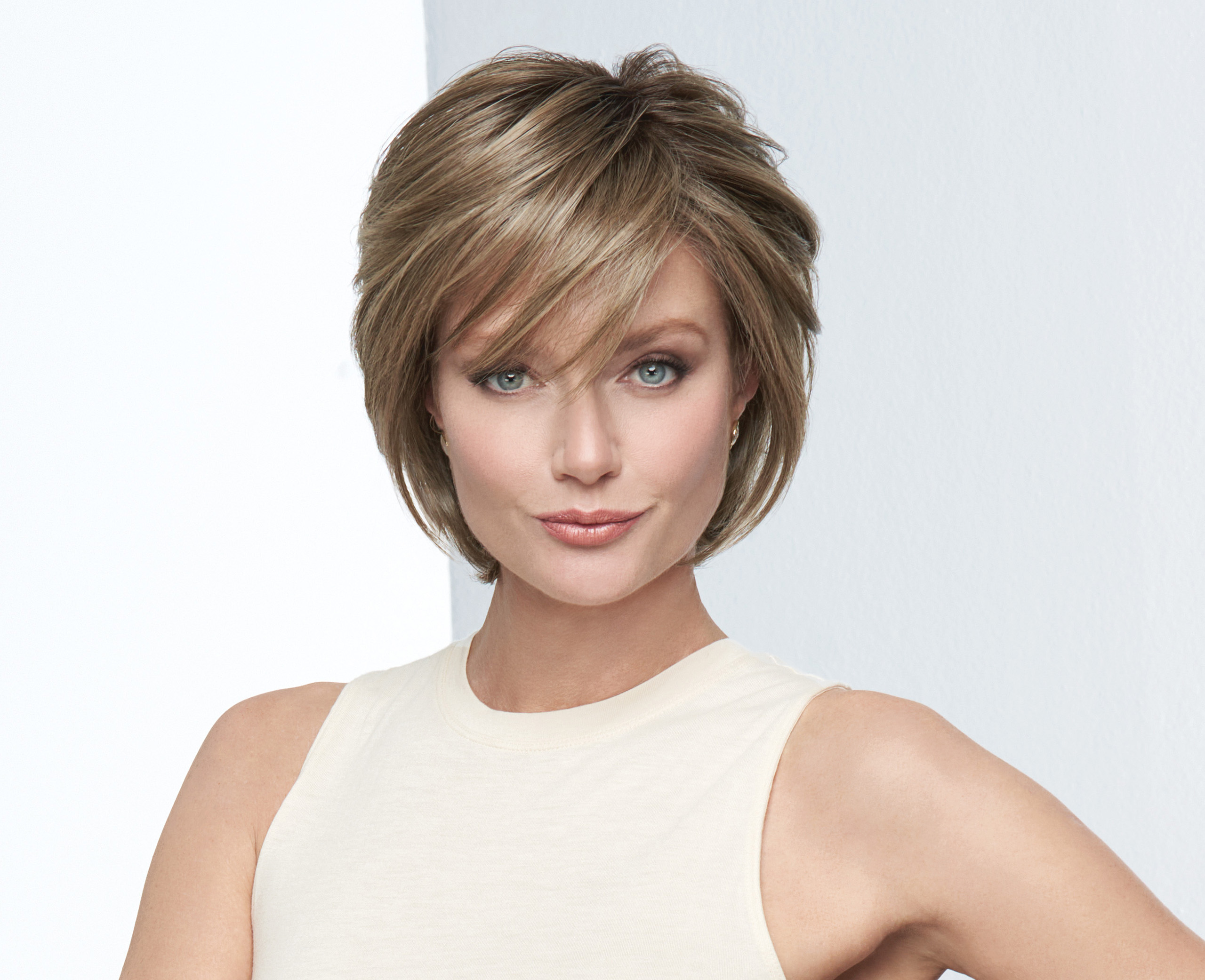 Model wearing Now Or Never by Raquel Welch Wigs