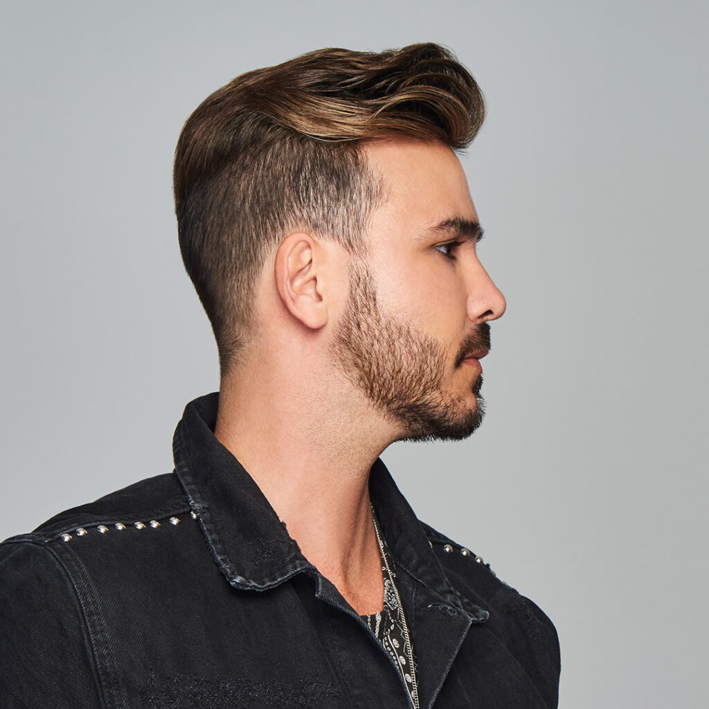 Side view of model wearing Gravity by American Hairlines
